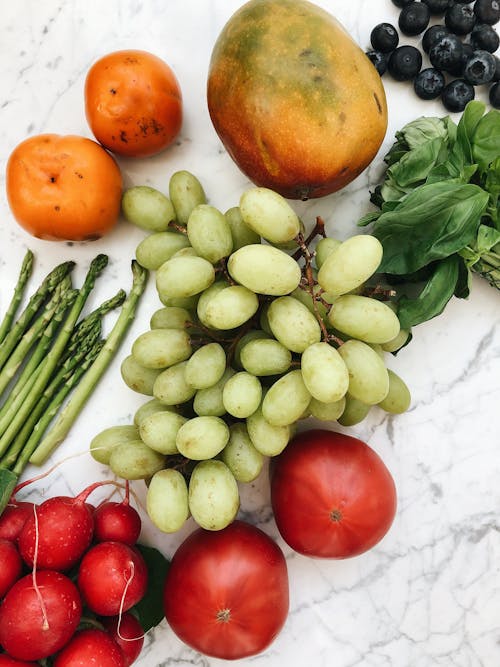 Close up of Assorted Fruits on White Surface 