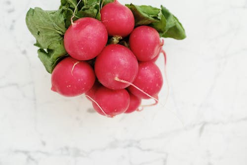 Red Radish on White Surface