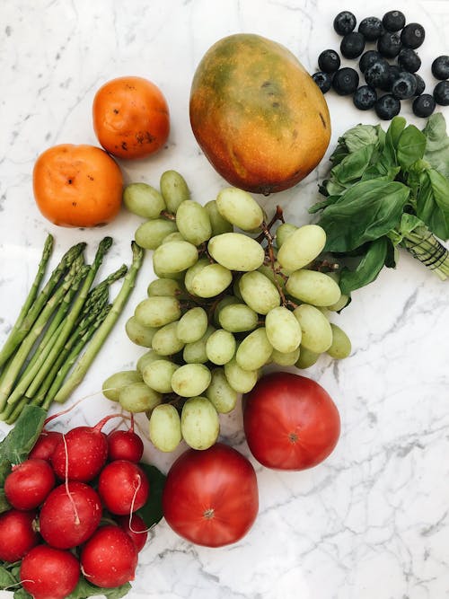 Fruits and Vegetables on a White Surface