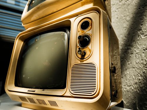 Free Close-up of an antique television with a classic retro design, showcasing nostalgic media technology. Stock Photo