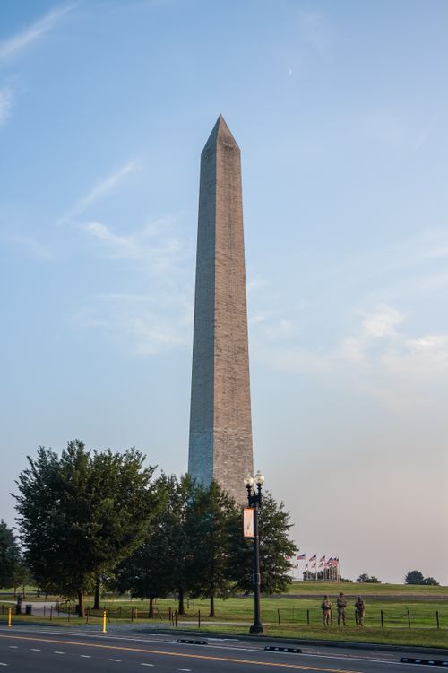 Free The Washington Monument standing proudly under a clear blue sky in Washington D.C., USA. Stock Photo