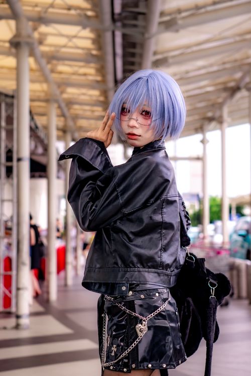 Free A stylish individual in cosplay poses confidently in an urban setting, showcasing a modern look. Stock Photo