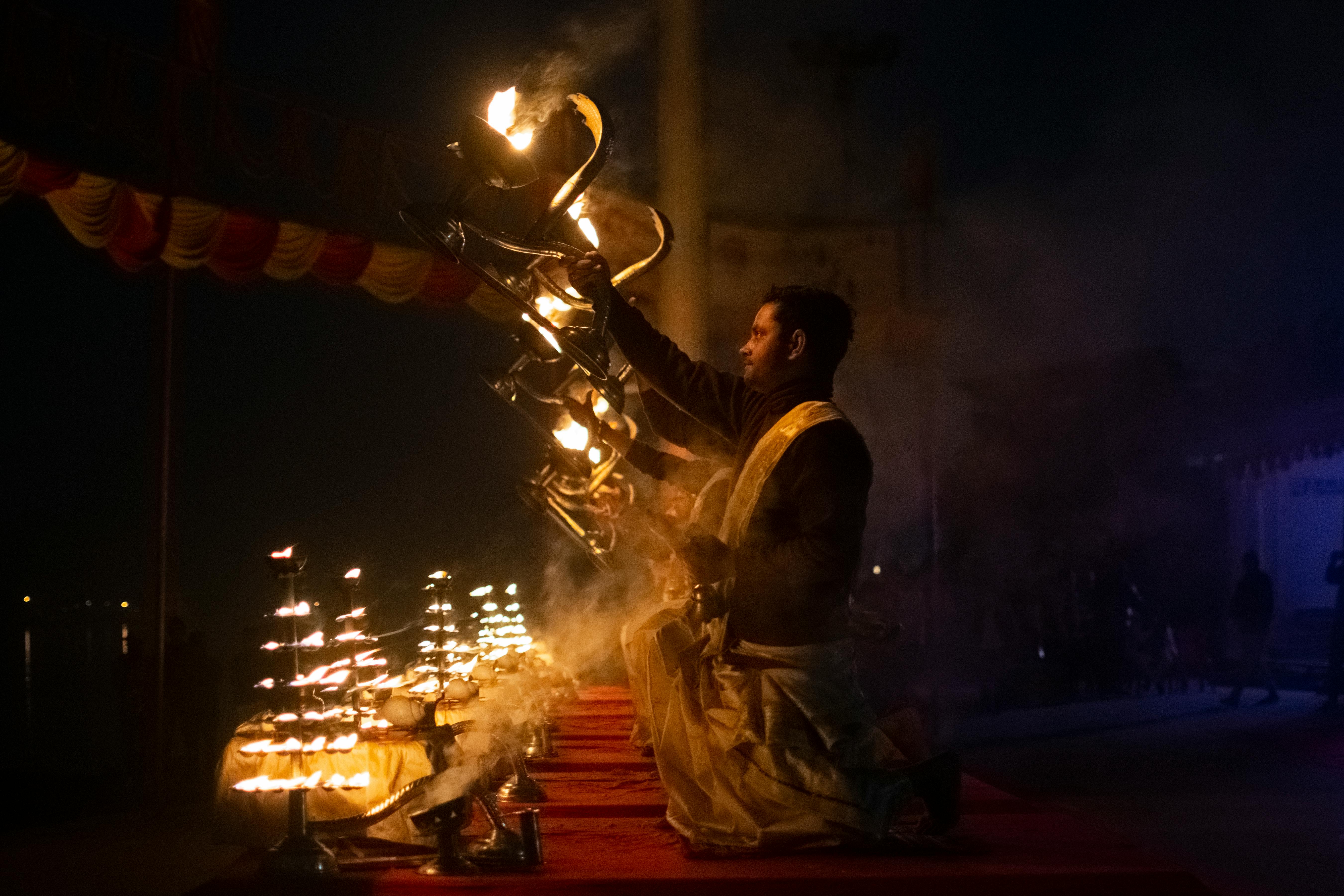 Hindu Priest Performing Religious Ganga Aarti Stock Photo - Download Image  Now - Varanasi, Ghat, Aarti - Praying - iStock
