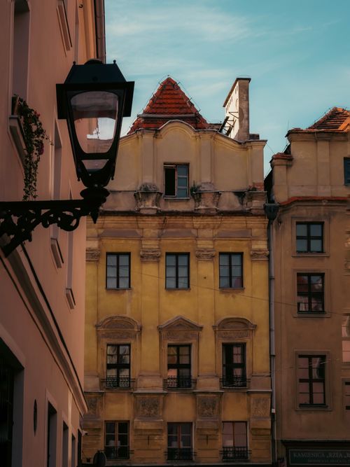 Free Beautiful historic buildings in Wrocław's Old Town under a clear sky. Stock Photo