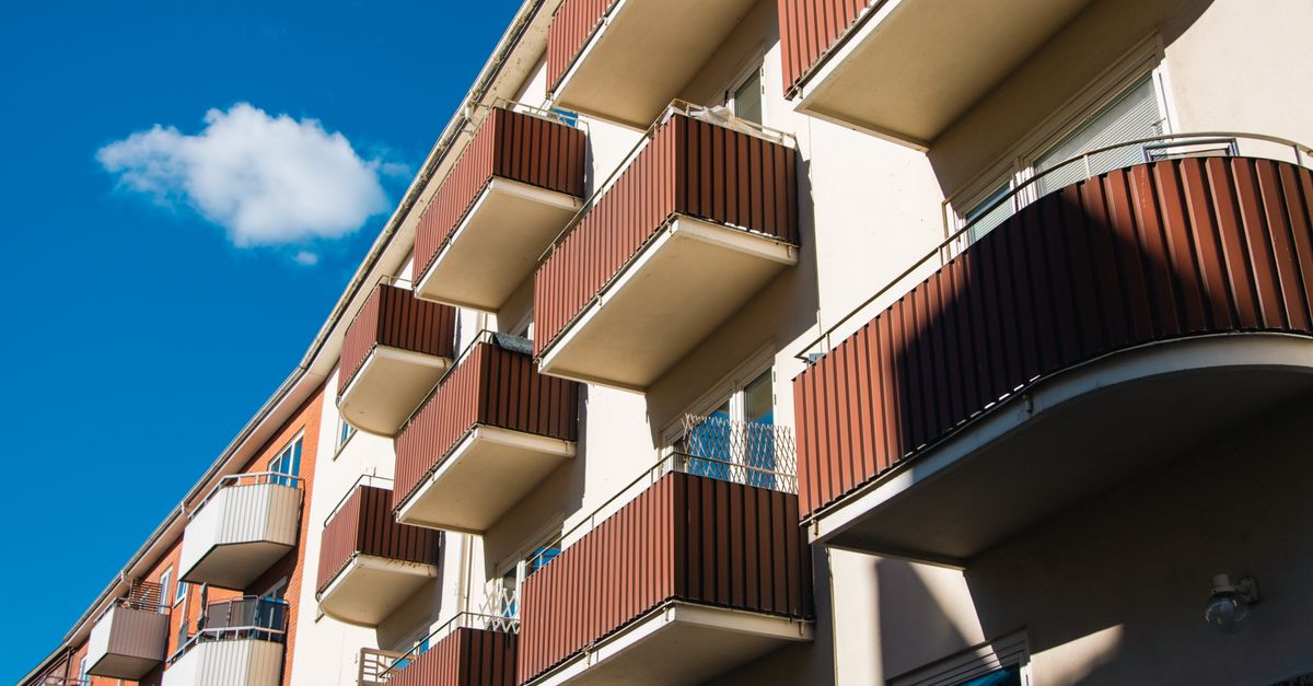 A series of brown and white balconies on a sunny day in Jönköping, Sweden.