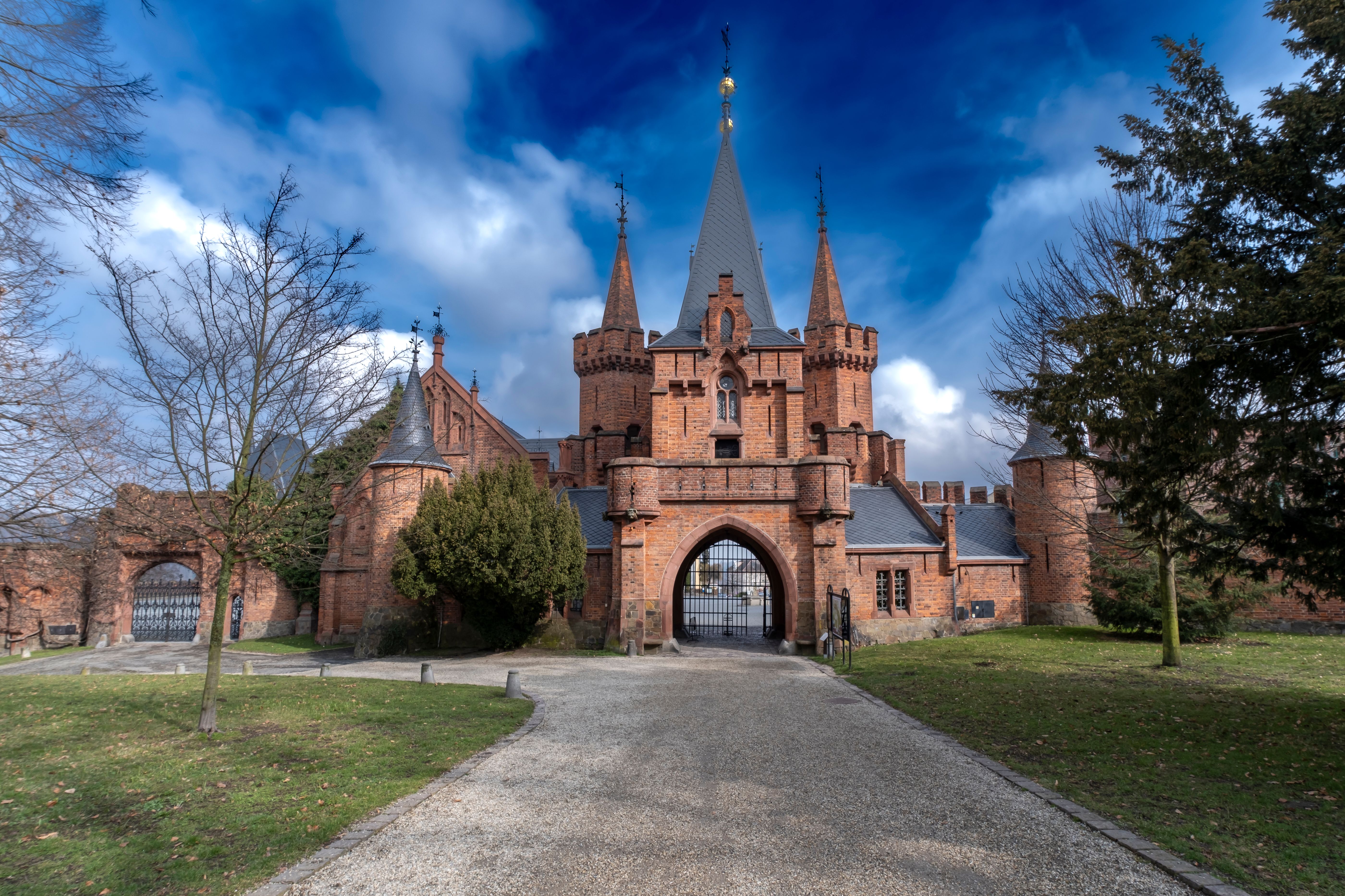 Explore the stunning architecture of a medieval castle in Hradec nad Moravici, capturing rich history and gothic design.