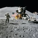 Astronaut Standing Beside American Flag on the Moon