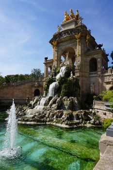 View of the stunning Cascada Monumental fountain in Barcelona's Parc de la Ciutadella on a sunny day.