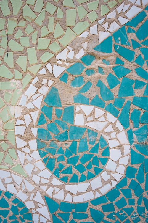 Free Vibrant mosaic artwork in a courtyard in Samarkand showcasing intricate geometric patterns. Stock Photo