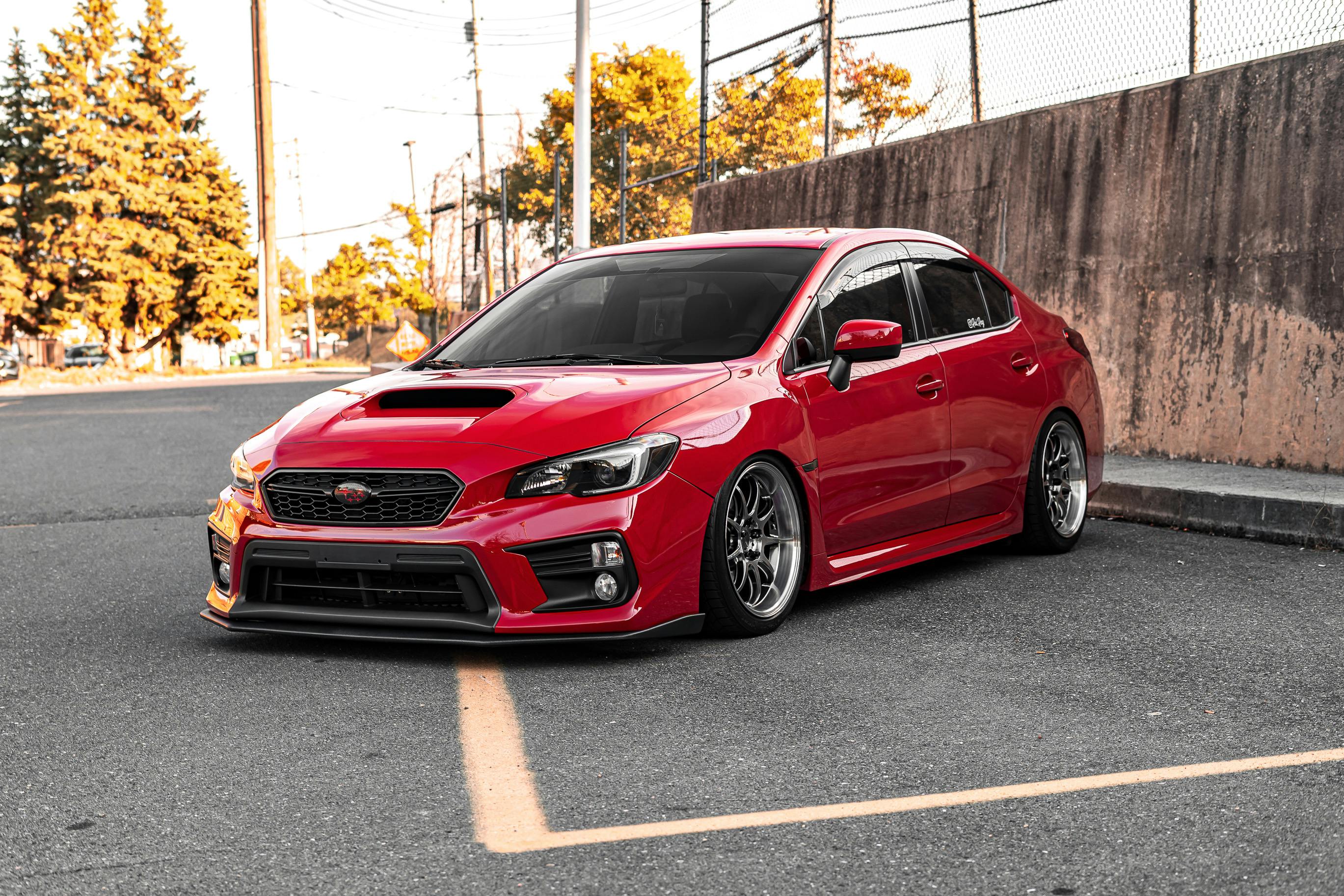 Red Subaru Sedan on Road · Free Stock Photo