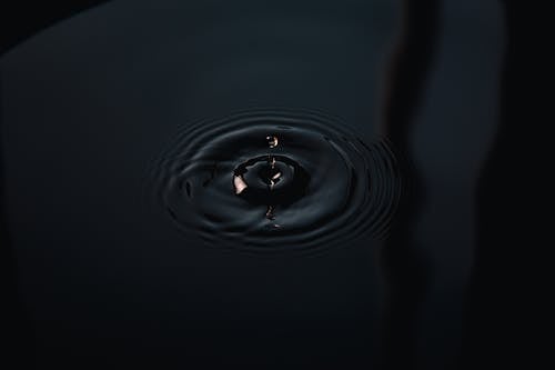 Water Drop on Water in Grayscale Photography