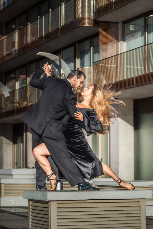Free A passionate tango dance performed by a couple outdoors in Buenos Aires. Stock Photo
