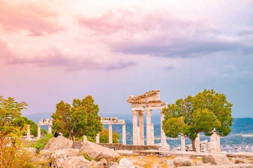 Free Scenic view of the ancient Pergamon ruins with a vibrant sunset sky. Stock Photo