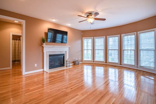 Brown 4 Blade Ceiling Fan and Wooden Flooring