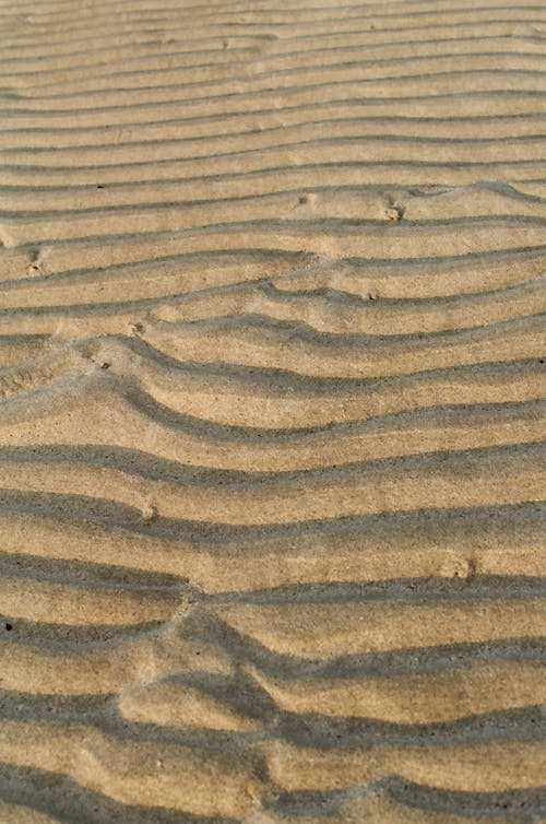 Free Waves on Sand Stock Photo