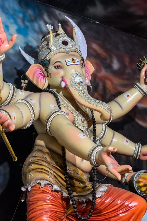 Free Vibrant Ganesha idol in Mumbai's Ganesh Chaturthi festival showcasing intricate artistry and cultural devotion. Stock Photo