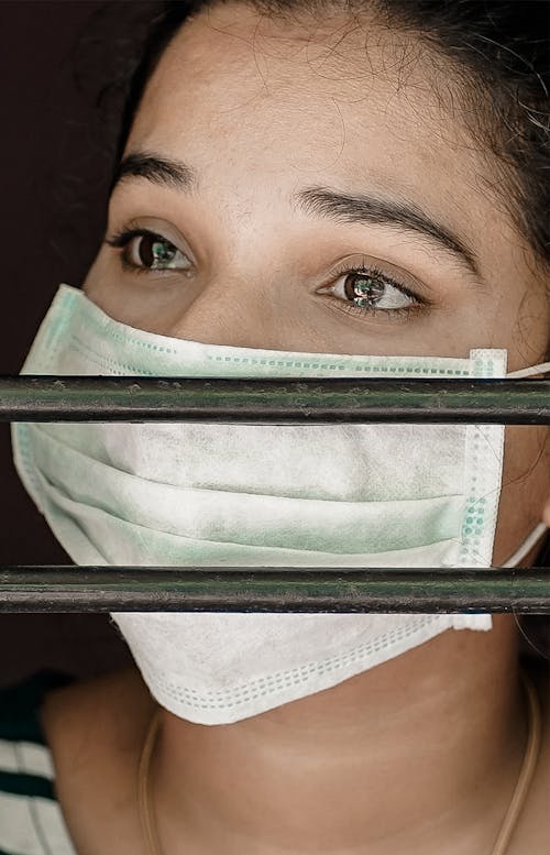 Woman Wearing Face Mask Crying