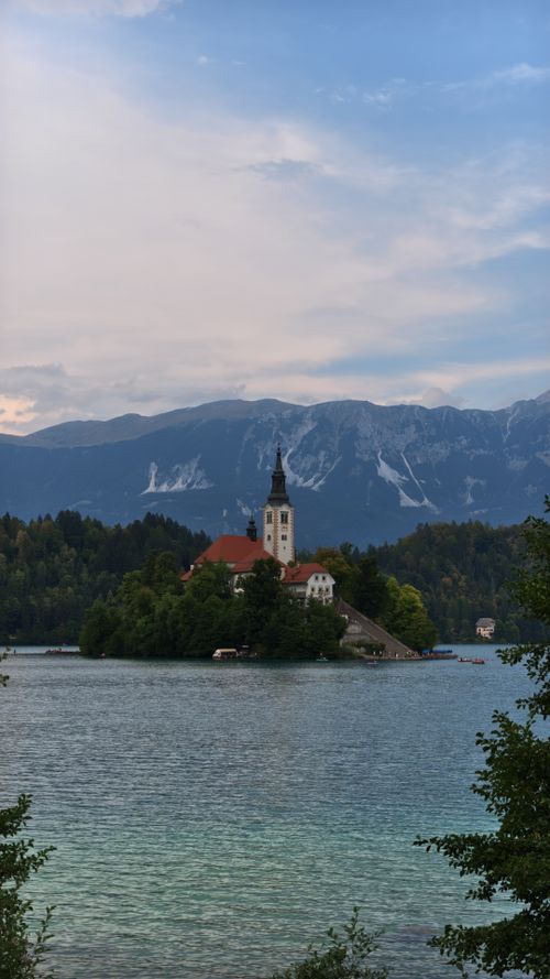Free Stunning image of Bled Island with church amidst serene waters and mountains. Stock Photo