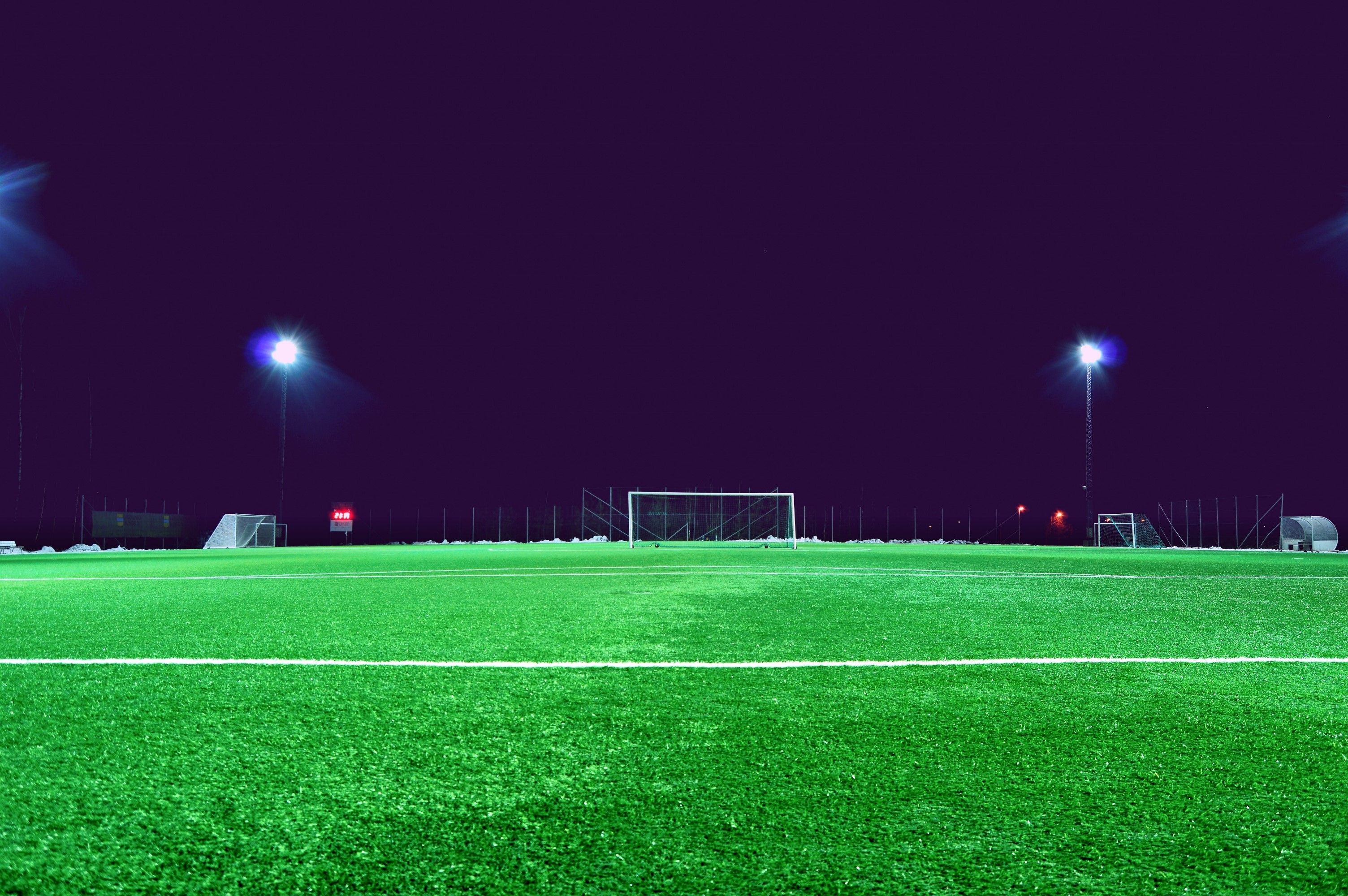 Soccer players competing in a match
