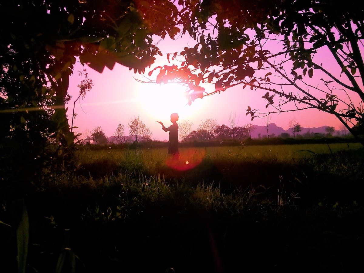 Football coach giving instructions on the touchline