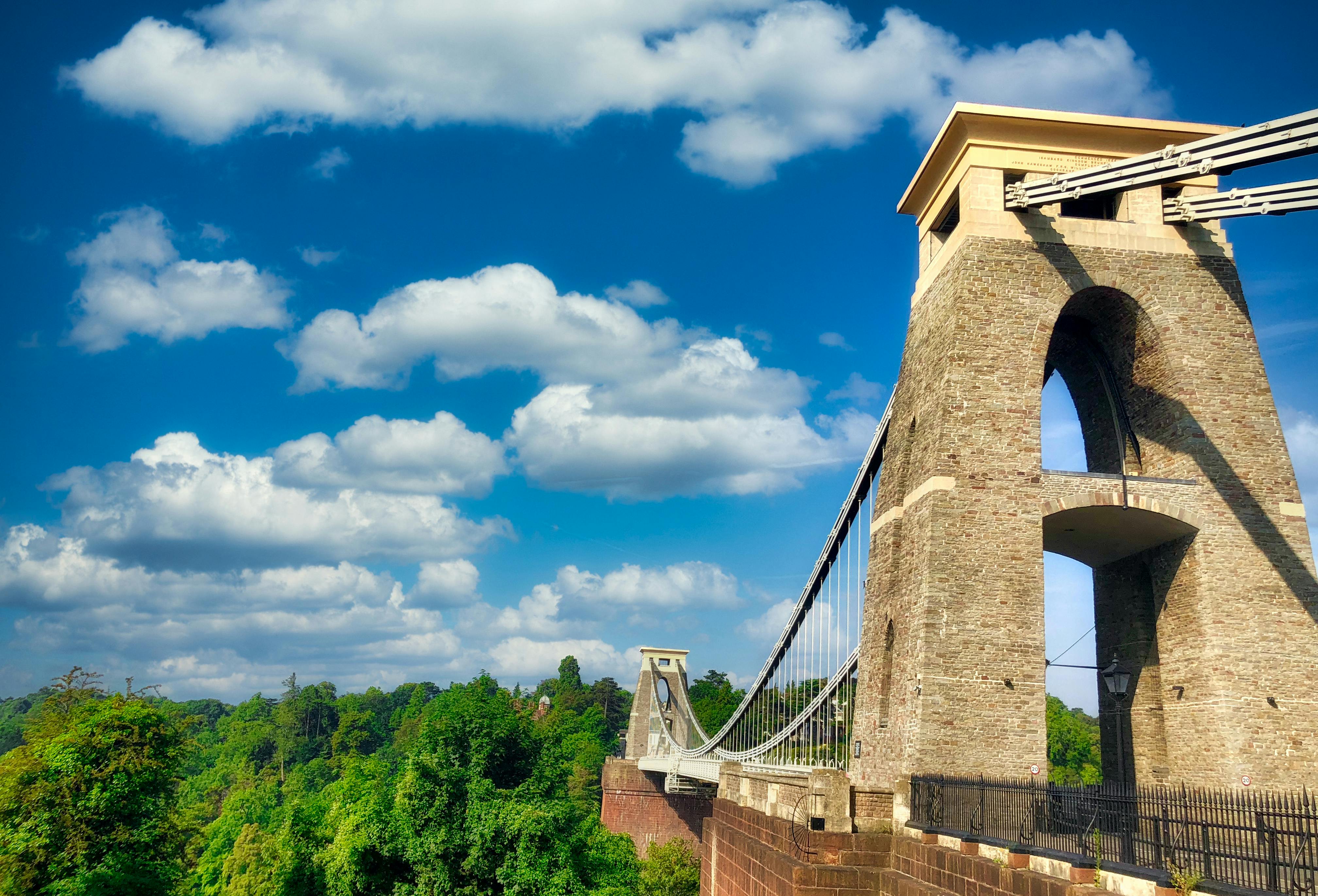 Two football players jumping for a header during a Premier League style match