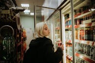 Woman Buying a Drink