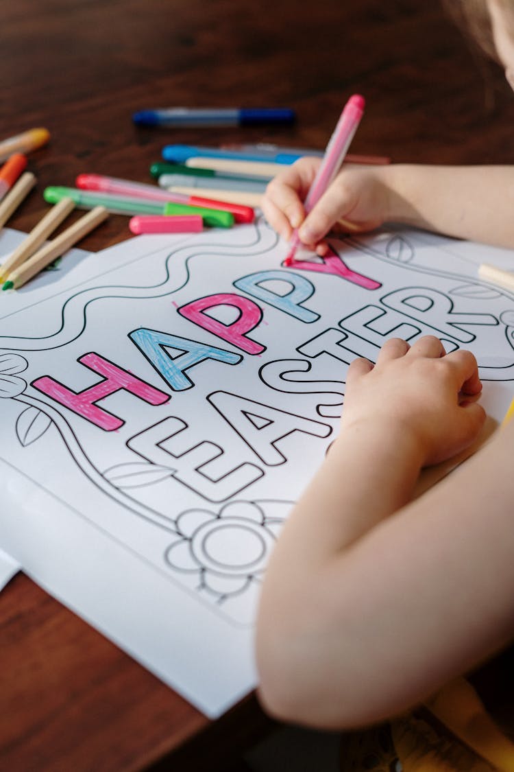 Person Coloring Happy Easter Print On White Paper