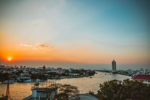 City Skyline Under Blue Sky during Sunset