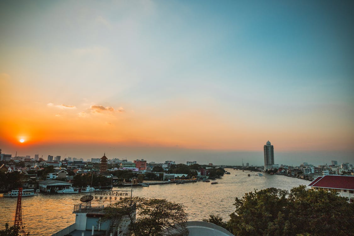 City Skyline Under Blue Sky during Sunset