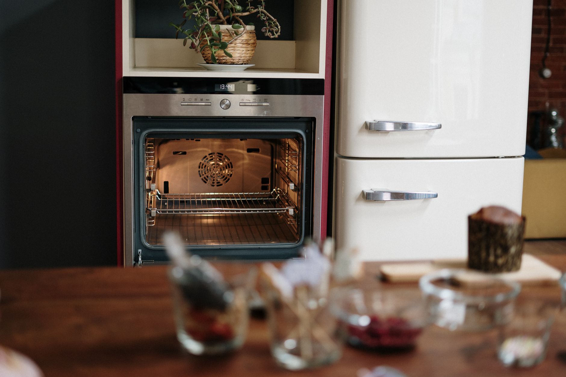 Open box of baking soda placed on fridge shelf for odor absorption
