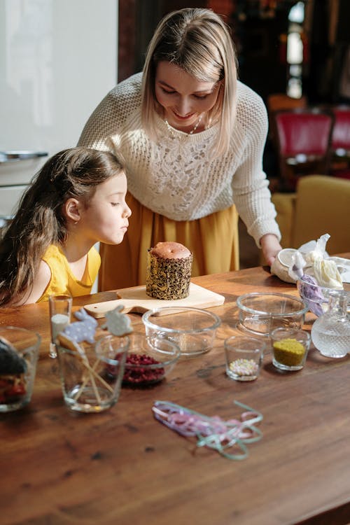 Free Little Girl Tasting the Cake Stock Photo