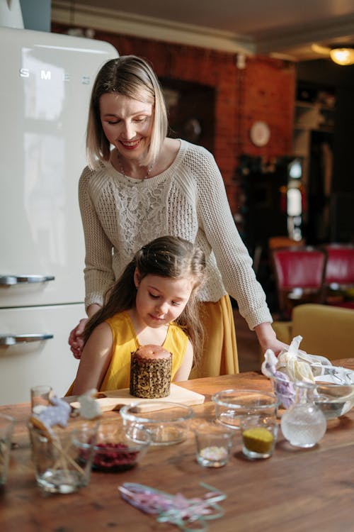 Little Girl Decorating a Cake