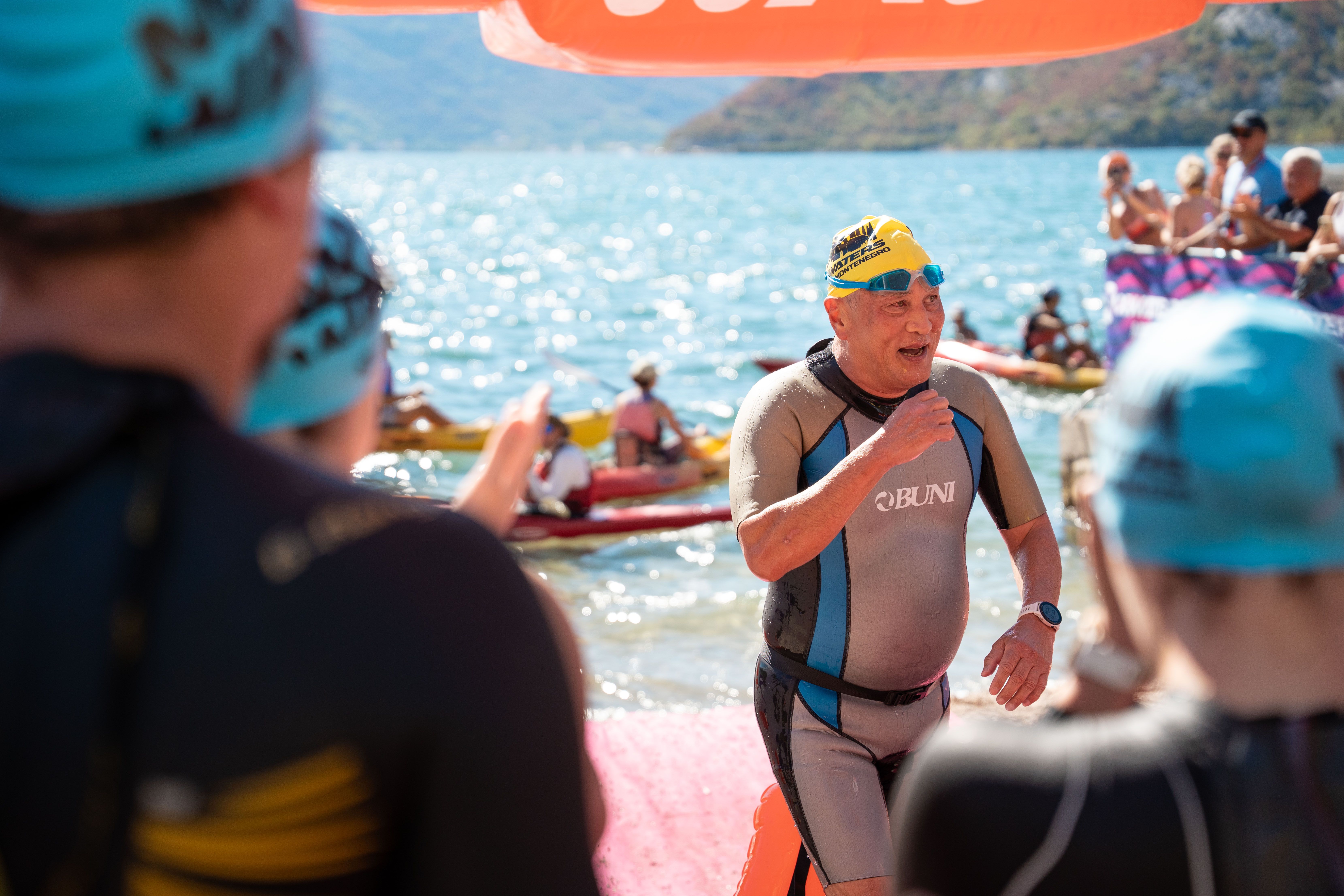 athlete swimming outdoor lake
