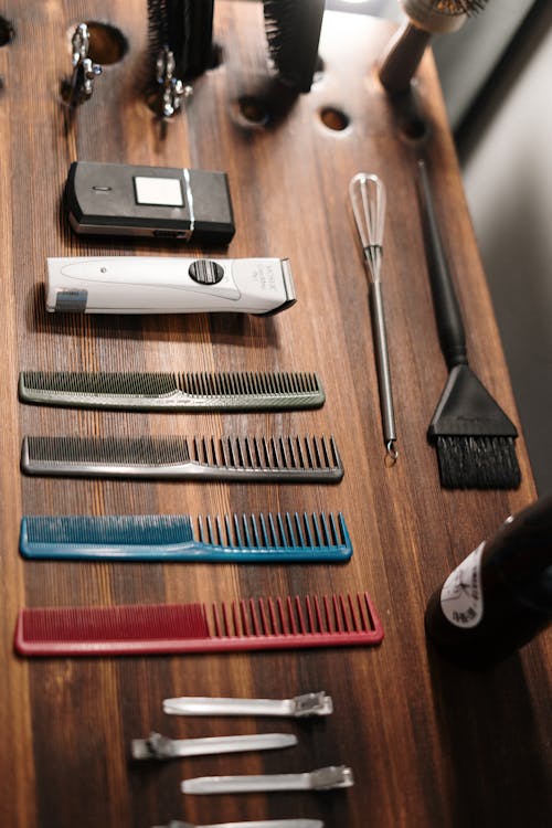 Stainless Steel Fork and Bread Knife on Brown Wooden Table