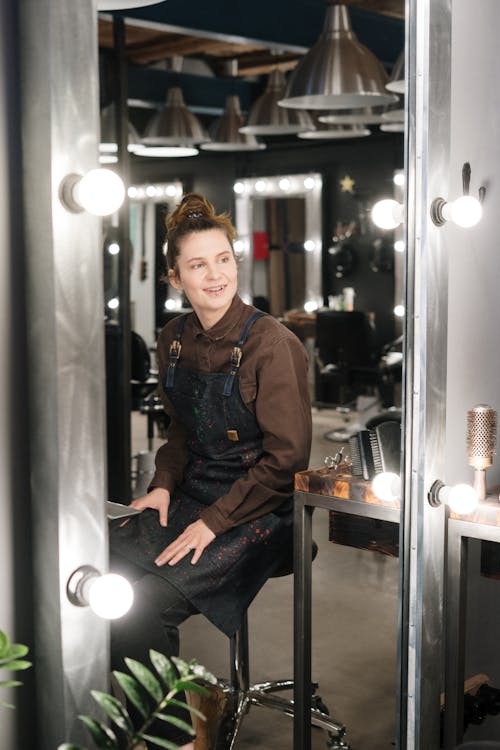 Free Hairstylist In Front of the Mirror Stock Photo