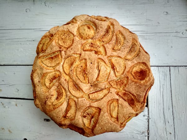 Client in kitchen with new hair color