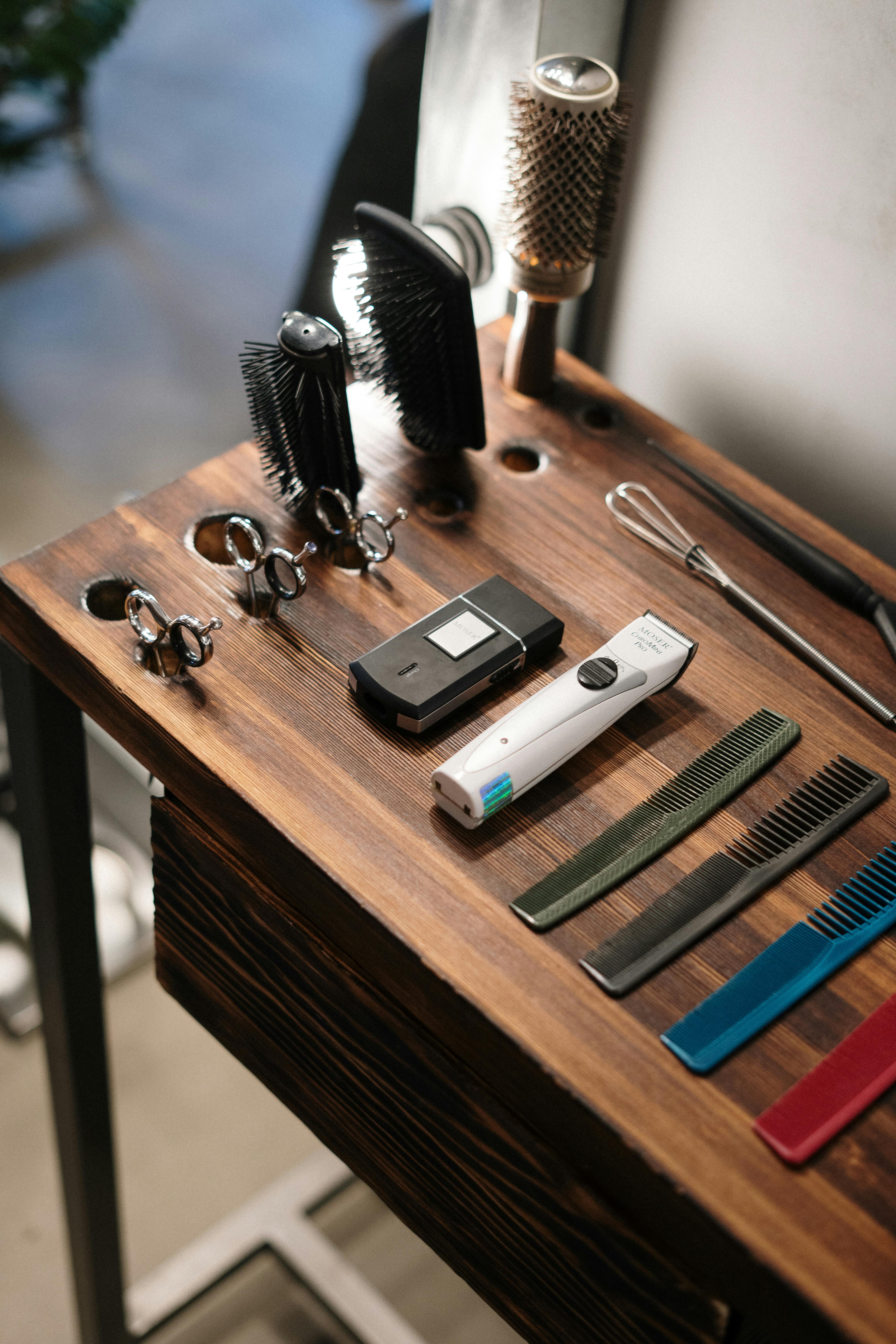 black and silver usb flash drive on brown wooden desk