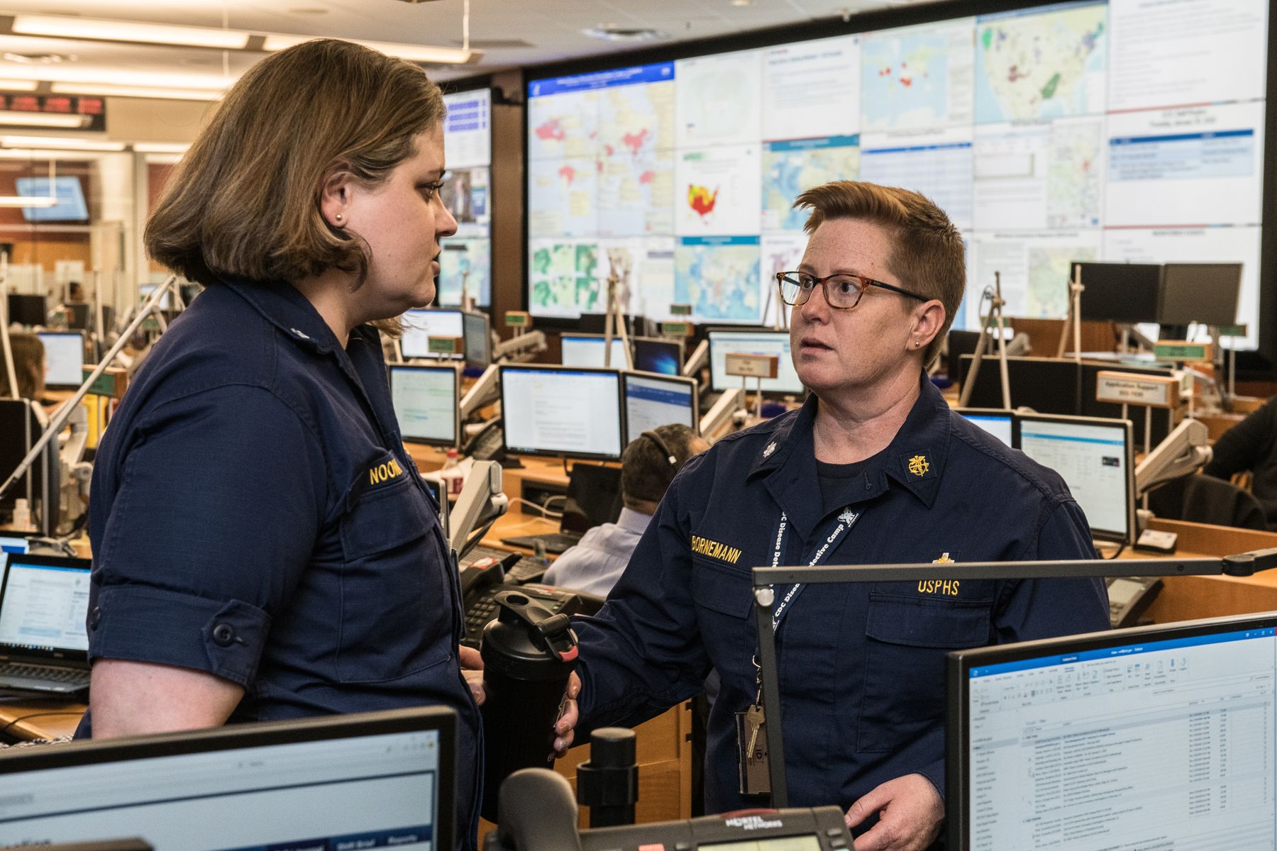 Professionals coordinating in a technical operations center