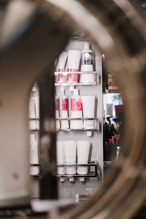 White and Red Labeled Plastic Bottles