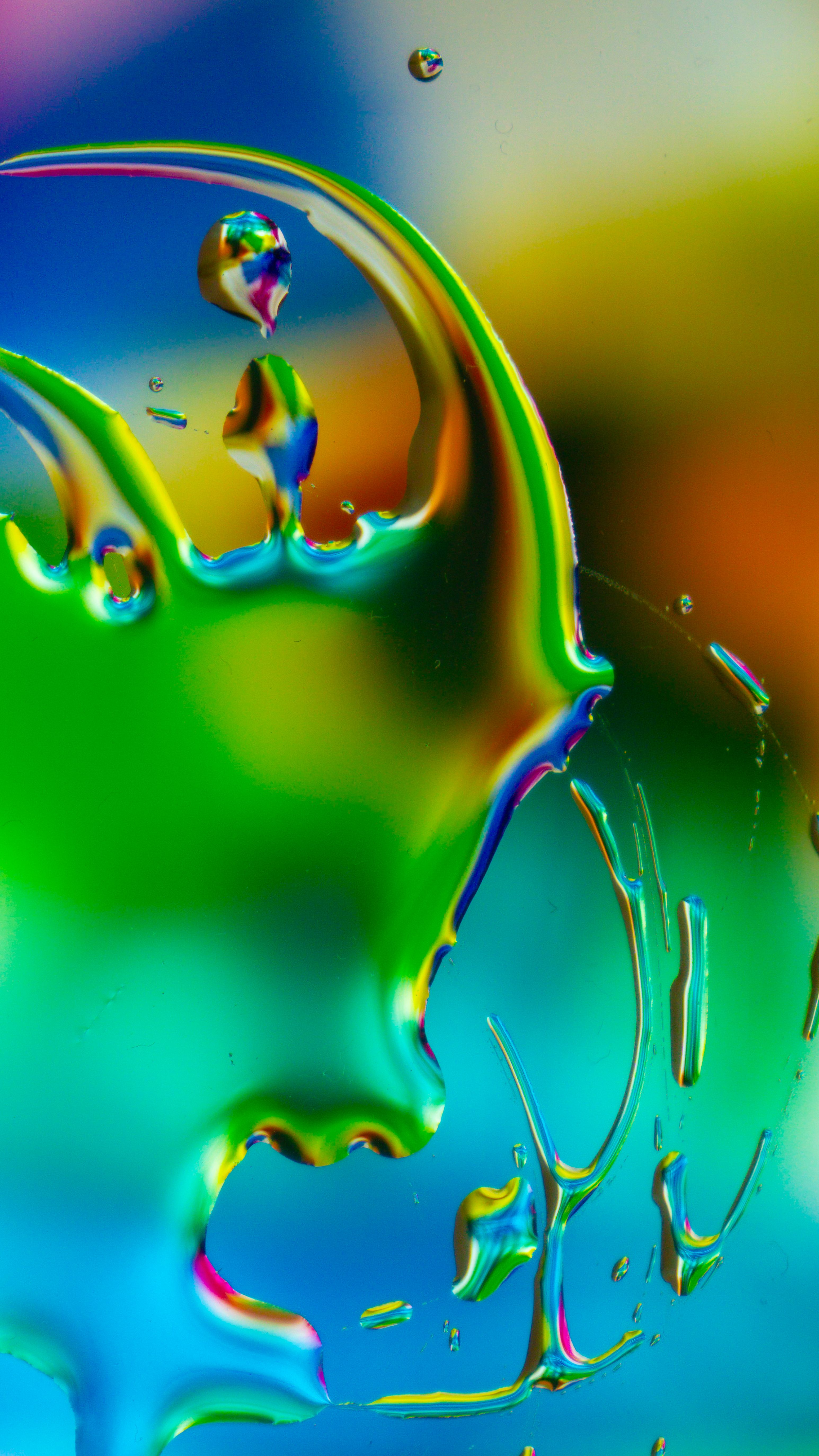 Fotomural Primer plano de coloridos patrones líquidos que crean arte abstracto. Los colores vivos y la composición dinámica lo hacen visualmente impactante.