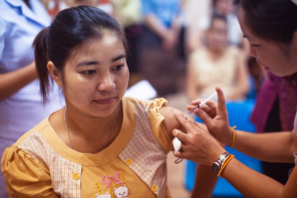Healthcare professional giving a vaccination