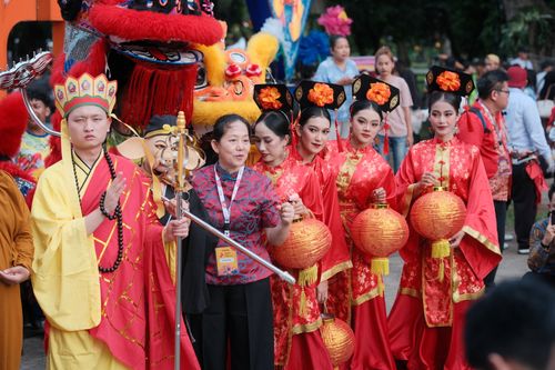 Free Group celebrating Chinese New Year with traditional costumes and lanterns in Jakarta. Stock Photo