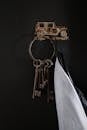 Gold Key Holder on Black Wall