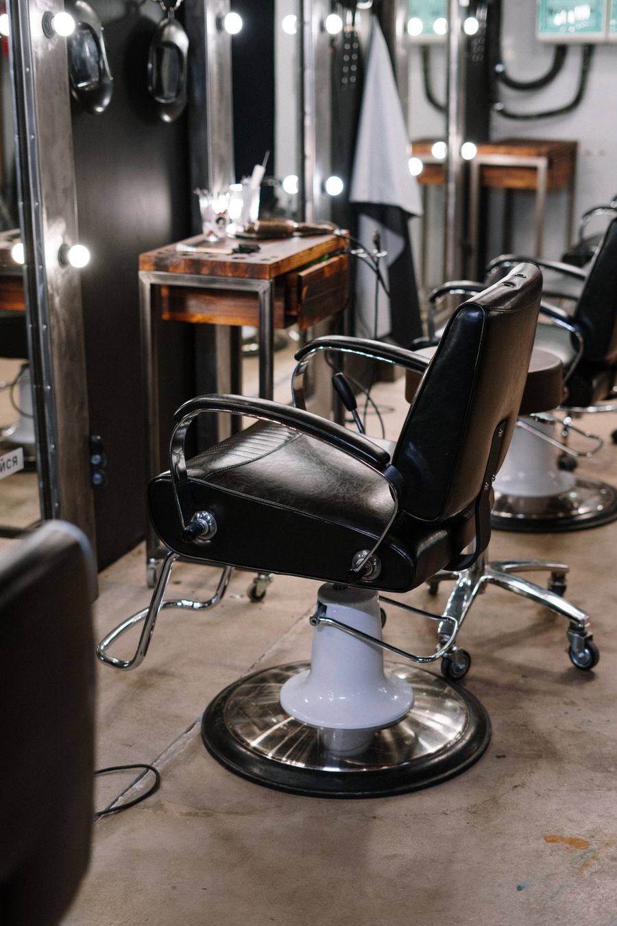 Salon chair and mirror in an elegant studio setting
