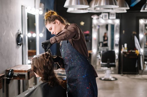 Free Woman Getting a Haircut Stock Photo