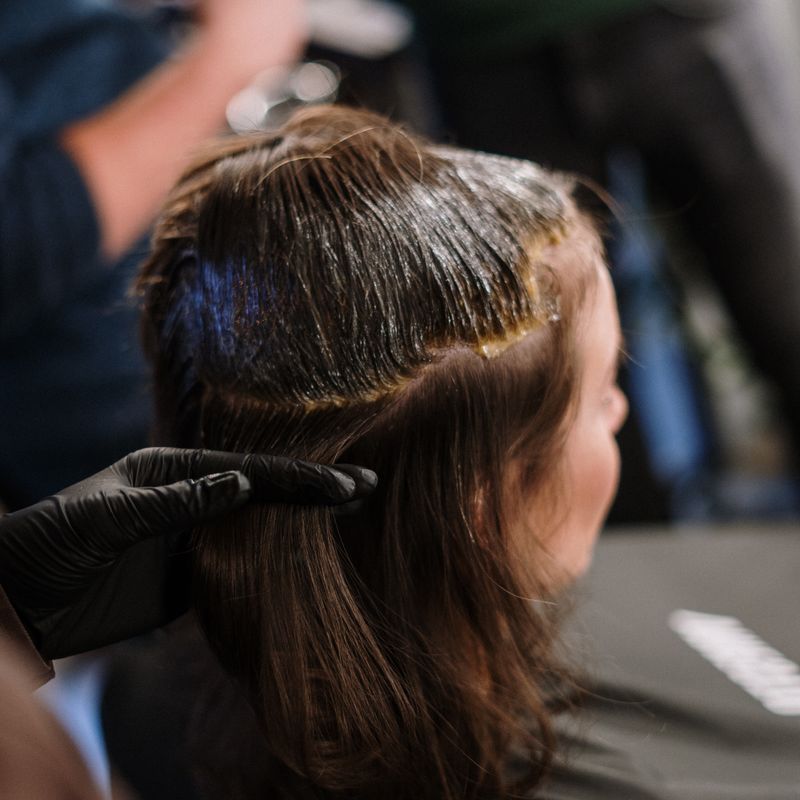 Hair colour being applied in a salon