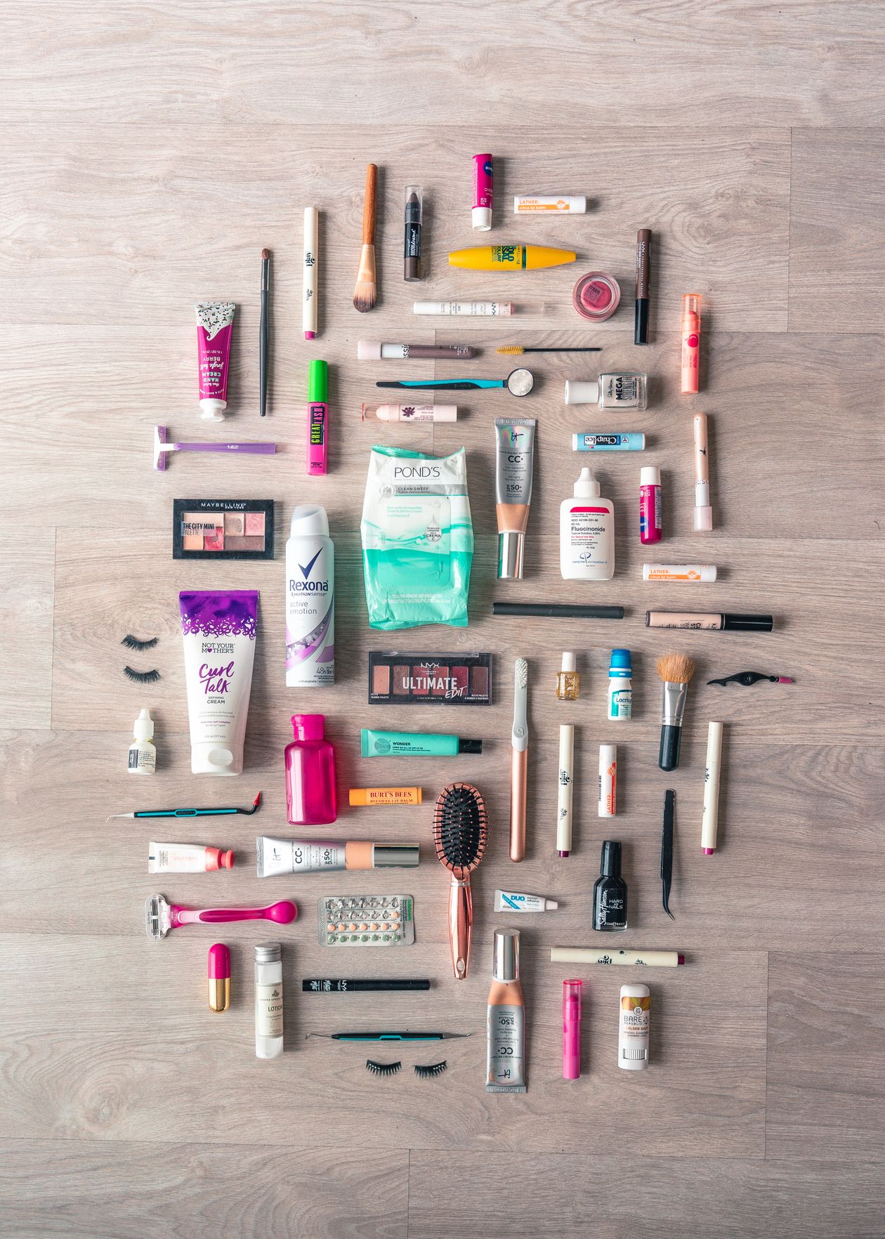 Flat lay of beauty and personal care products styled for e-commerce secondary listing images