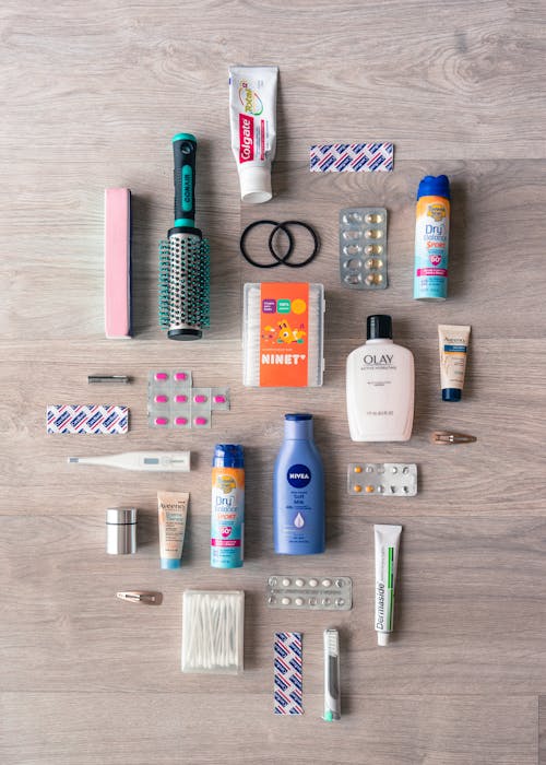 Flat Lay Photo of Essential Toiletries