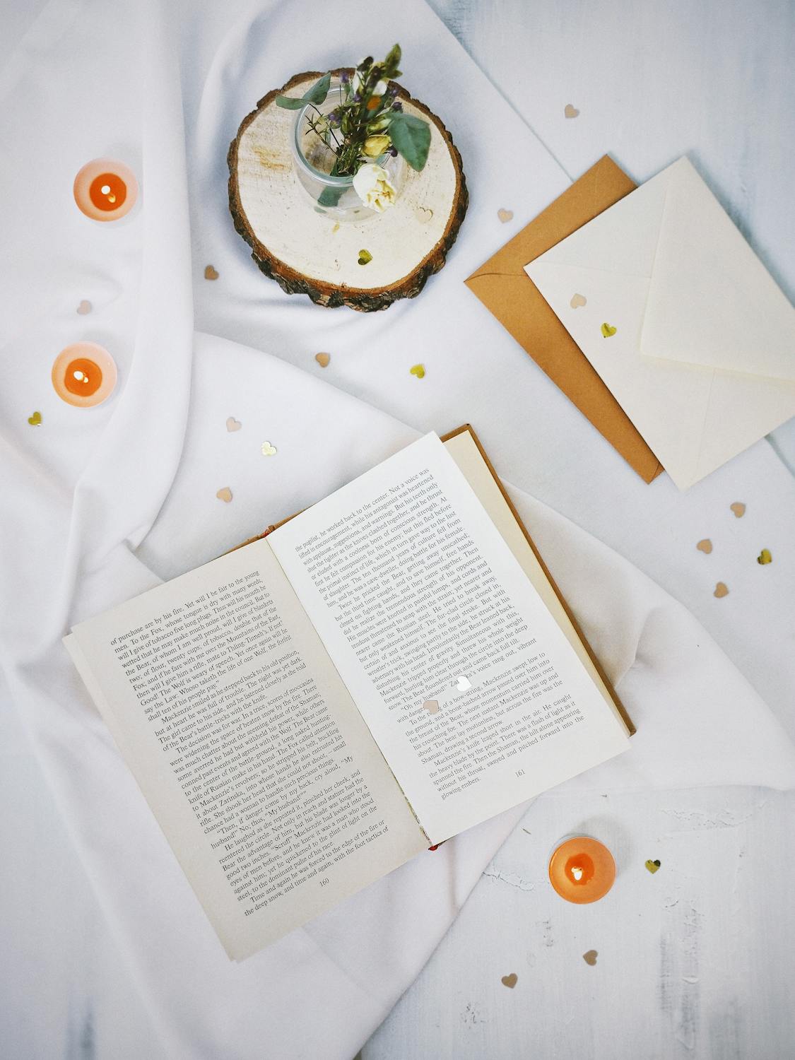 White Book Page on White Table Cloth · Free Stock Photo