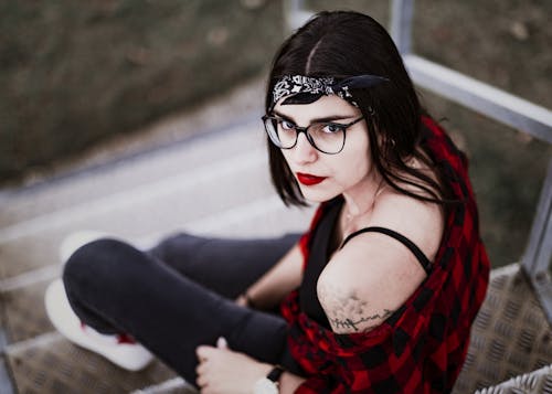 Woman In Red And Black Plaid Top